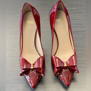 Inniu high heels with bow and cutout detail